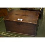 A George III mahogany ballot or letter box, hinged cover with aperture, kite shaped escutcheon,