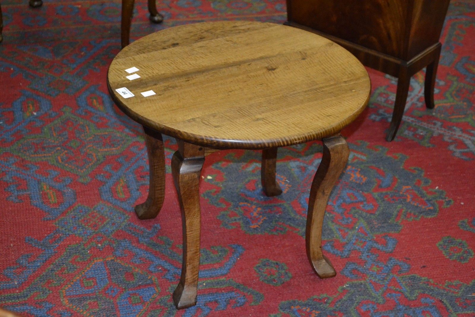 A circular hardwood table.