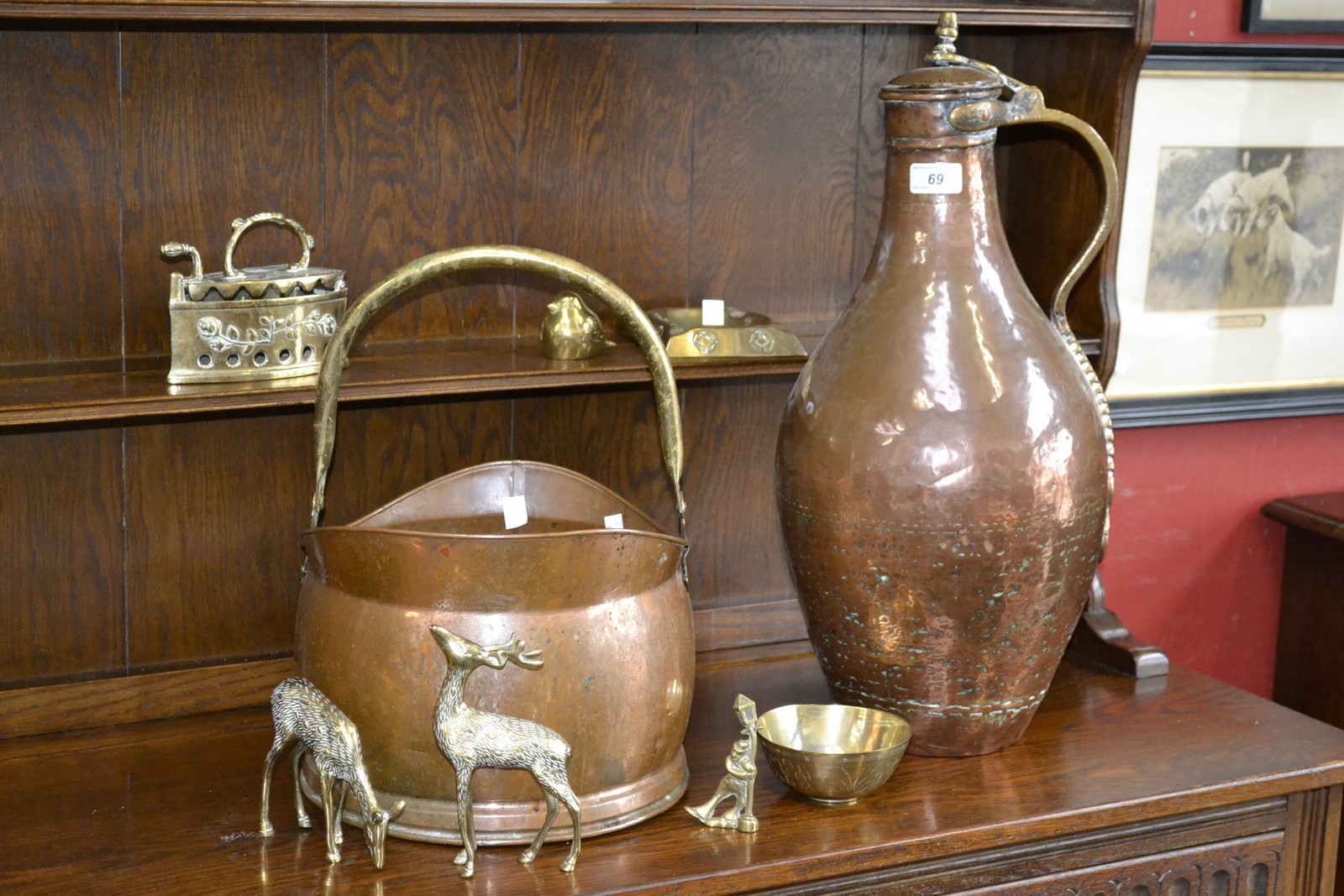 Metalware - a Middle Eastern copper and brass flagon; a coal scuttle brass iron;