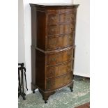 A reproduction mahogany bow fronted chest on chest, stepped cornice,