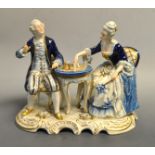 A German porcelain figure group, The Chess Game, 16.