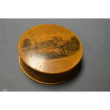 A 19th century turned treen snuff box, the cvover in monochrome with Balmoral, c.
