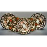 A Royal Crown Derby 2451 pattern side plate; a pair of larger conforming,