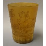 A 19th century horn beaker, continuous engraved scene of the hunt, with riders, hounds,