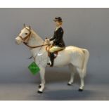 A Beswick Huntswoman, on Grey, Style Two, with original paper tag,