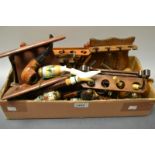 A collection of pipes, various designs and materials, mostly early 20th century,