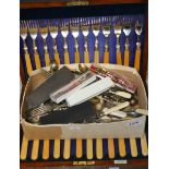 A set of twelve cased fish knives and forks; a box of cutlery;