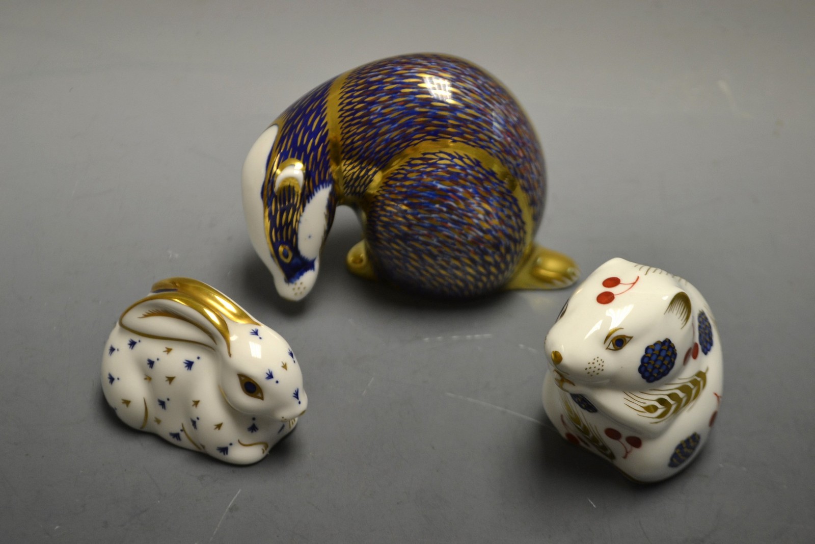 A Royal Crown Derby paperweight Badger; others, Harvest Mouse, Baby Rabbit,