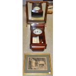 An oak rectangular dressing table mirror ; a  modern mahogany wall clock,