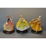 A Royal Doulton figure Autumn Breezes HN2131; others, Kirsty HN2381, Last Waltz HN2315,