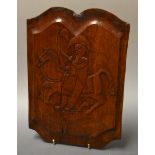 Folk Art - a 19th century panel, naively carved with a mounted cavalry soldier, 28cm high, 20.