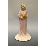 A Royal Doulton figure HN1600, The Bride issued 1934 - 1949, green marks (hairline crack to base).