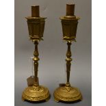 A pair of gilt metal novelty table lighters, as street lamps,