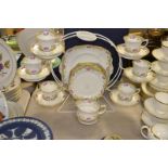 A Paragon six setting tea service decorated with pink and red roses,