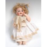 A German Kestner porcelain head socket doll, blond wig, sleep brown eyes, composite body, no 257,