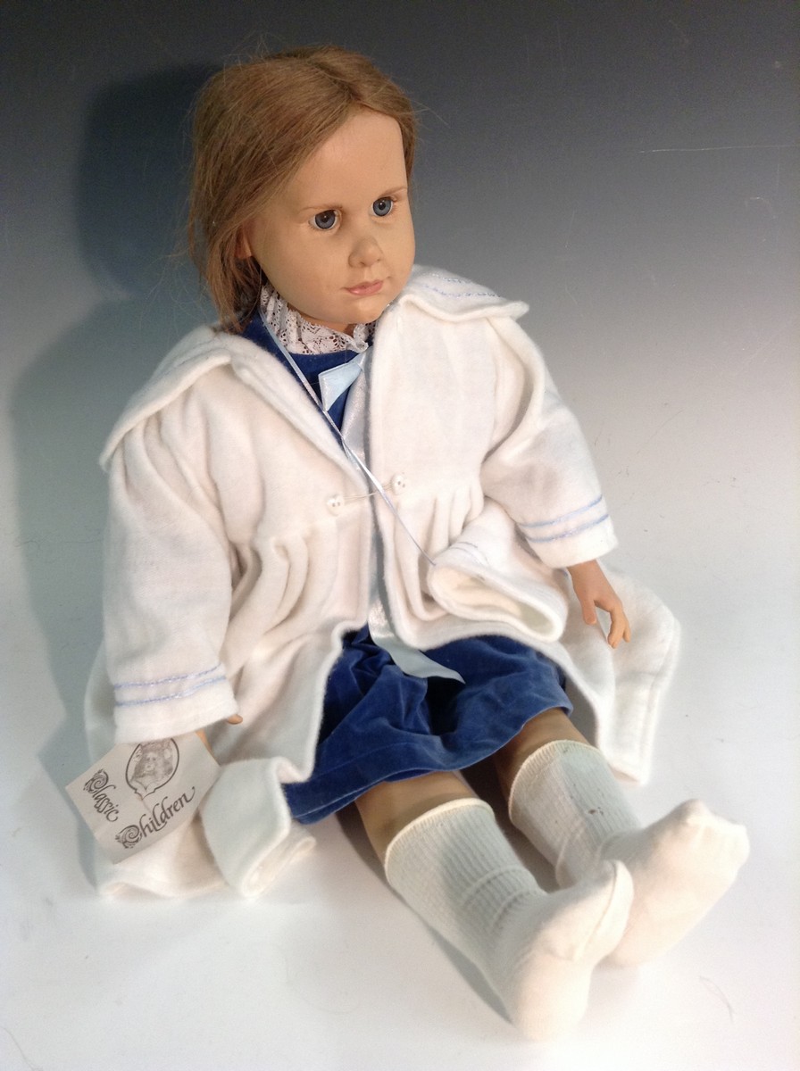 Hildegard Gunzel - a  Celluloid doll, as a little girl, fixed blue eyes, mousy brown wigs,