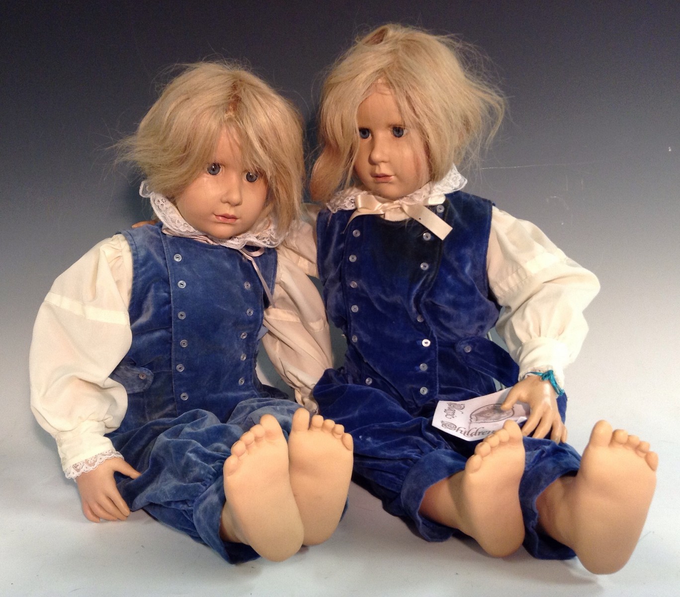 Hildegard Gunzel - a pair of Celluloid dolls, the Twins, fixed blue eyes, blond wigs,