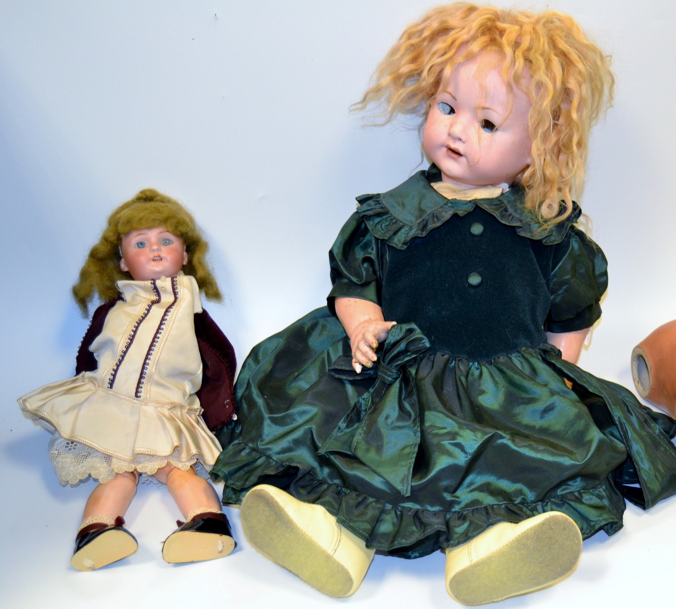 An early 20th century Heubach Koppelsdorf bisque head baby dolls, open mouth, two teeth, 57cm high,
