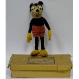 A Deans Mickey Mouse, velveteen body and head, ‘googly’ eyes, red, large yellow hands,  24cm high,