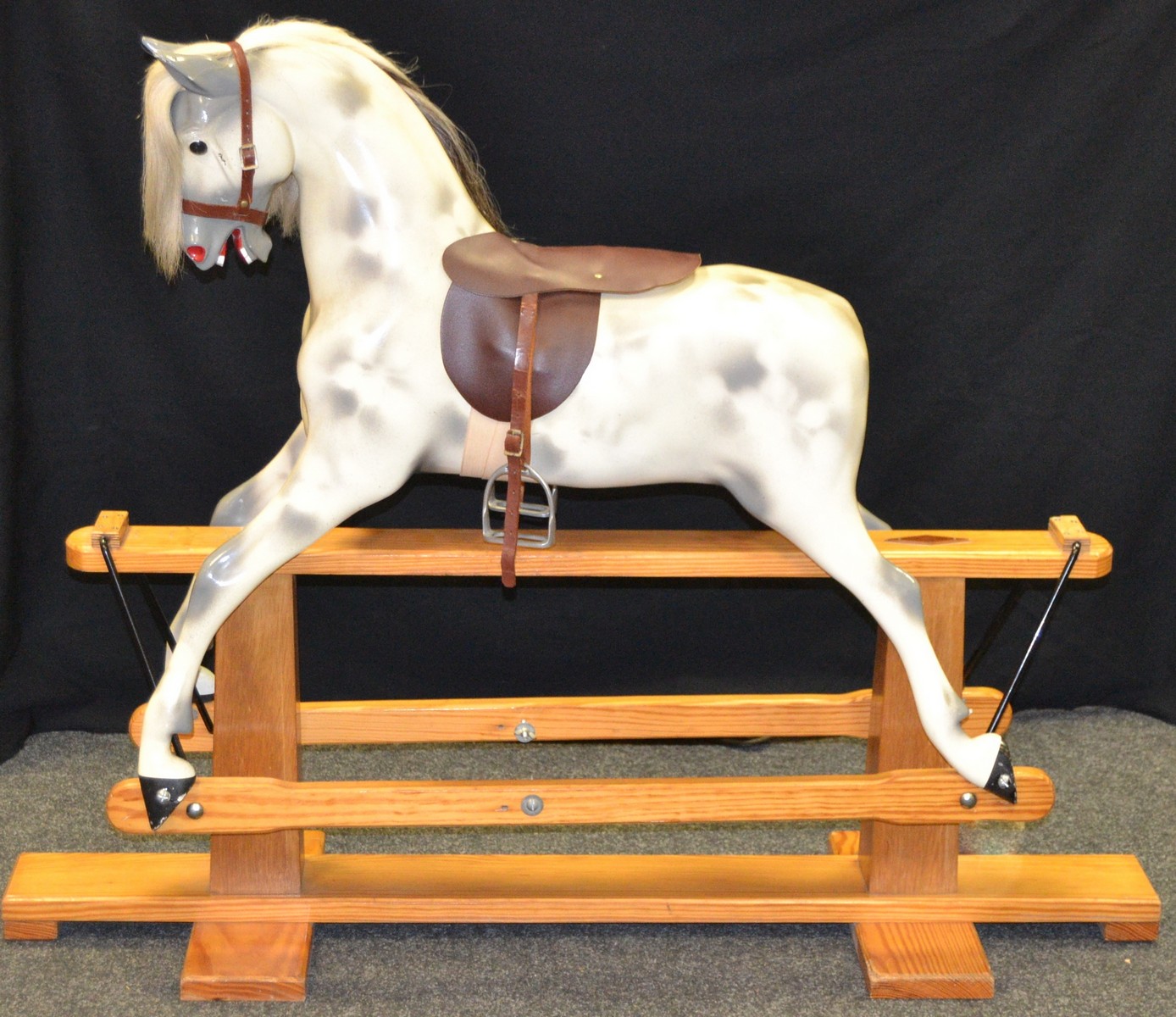 A Hadden Rockers Rocking Horse, leather bridle and saddle,