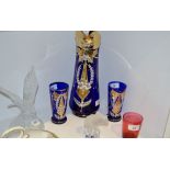 Glassware - a Bohemian cobalt blue lemonade jug and two beakers ; a clear glass eagle;