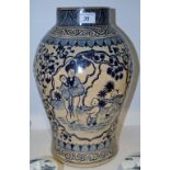 An Oriental blue and white ginger jar, lacking cover.