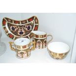 A Royal Crown Derby 1128 cream jug and sugar bowl,