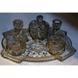 An early 20th Century glass dressing table set