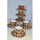 A set of six Royal Crown Derby 1128 coffee cups and saucers,