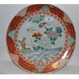 A Japanese charger, birds and peonies in green, red and blue, the border in iron red,