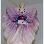 A Royal Doulton figure,  Isadora, in white and purple flowing gown,