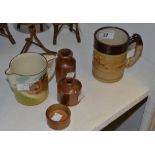 A Denby stoneware mug,