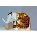 A Royal Crown Derby paperweight,