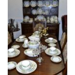 A comprehensive Royal Worcester Vine Harvest  pattern dinner service comprising of tureen and cover,