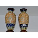 A pair of Doulton Lambeth slaters patent Chineware ovoid vases, 30cm high,