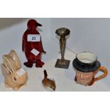 A Sylvac bunny spill vase; a Royal Copenhagen type wren model; a Doulton Penguin model;