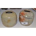 A pair of Oriental stoneware ginger jars,