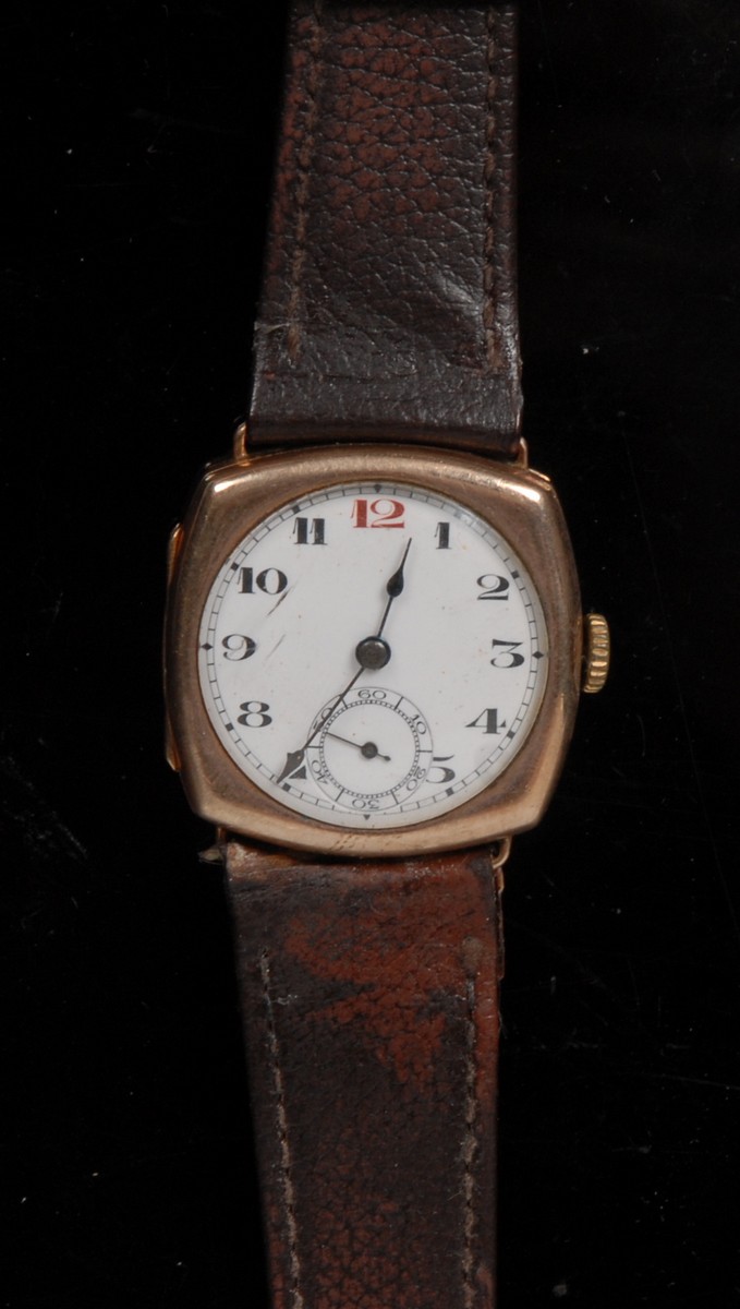 A 9ct gold gentleman's vintage wristwatch, white enamel dial, Arabic numerals, subsidiary seconds,