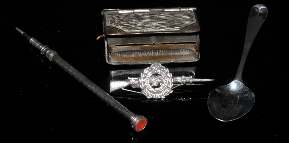 A sterling silver Royal Engineer's Regimental brooch;  a silver pencil;