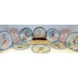 A set of seven Oriental collectors plates;  a cork model;  a resin elongated trinket box,