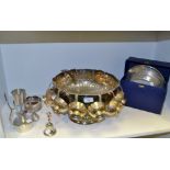 Silverplate-  a large punch bowl, floral swags,