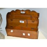 A late 19th century mahogany open waterfall stationery rack, c.