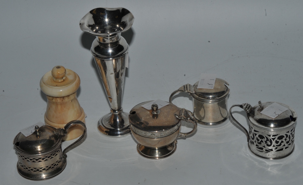 A collection of silver condiments; a bud vase, Birmingham,
