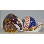 A Royal Crown Derby paperweight, Snail, gold stopper; a Royal Crown Derby paperweight Badger,