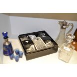 Glassware - a boxed Royal Doulton cut glass decanter and tumbler set;