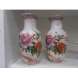 pair of hand painted oriental vases