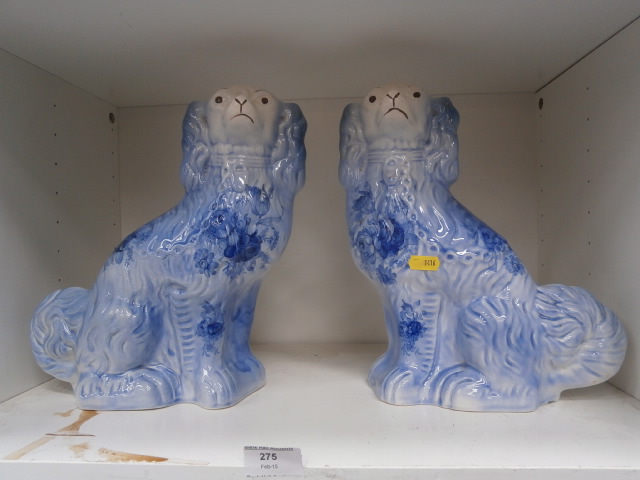 pair of blue and white mantel dogs