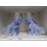 pair of blue and white mantel dogs