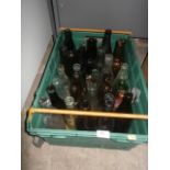 box of green glass bottles