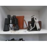 pair of binoculars and a vintage kodak travel camera